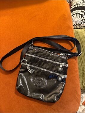 Kipling Black Shiny Nylon Crossbody Bag with Silver Hardware